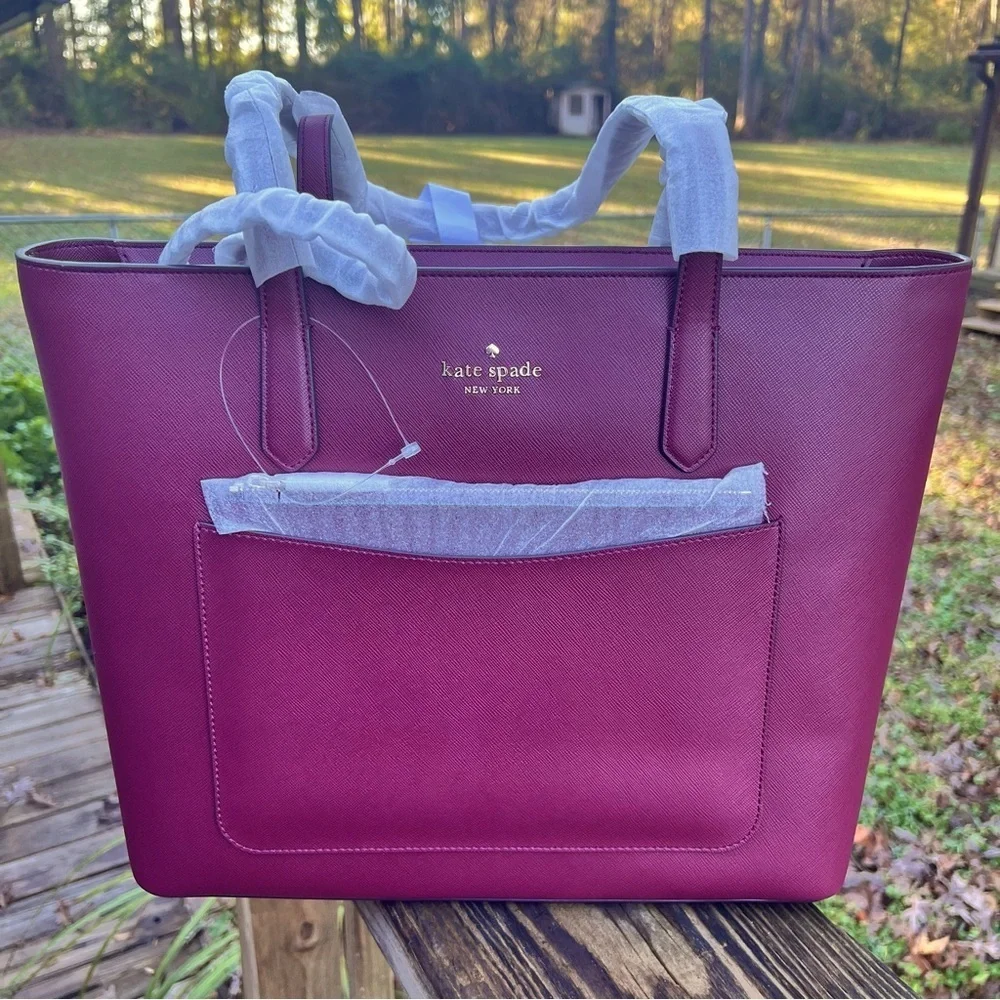 Kate Spade 3 piece set with tote wristlet and pouch